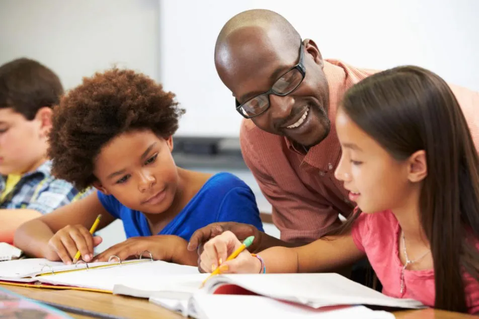 Diverse students learning together in a classroom